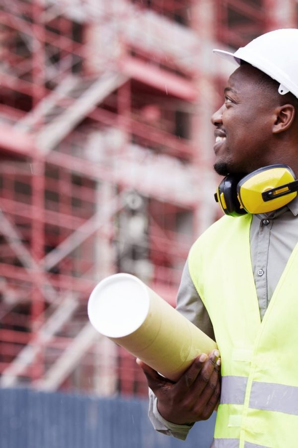 Cropped shot of a handsome young construction worker standing on a building site.