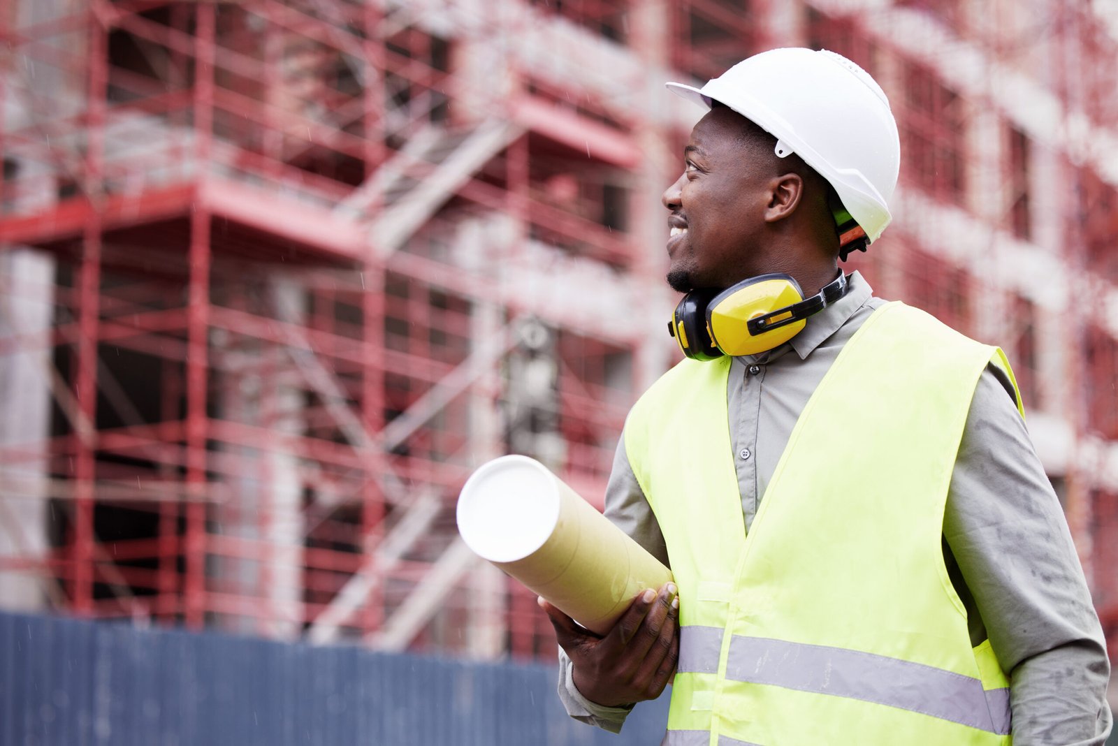 Cropped shot of a handsome young construction worker standing on a building site.